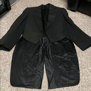 Vintage classic black wool tuxedo jacket with satin lapels and tails